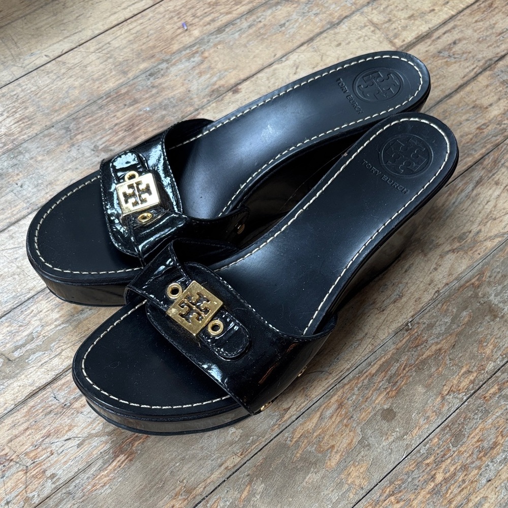Tory Burch Black Patent Leather Wedge Mules with Gold Logo